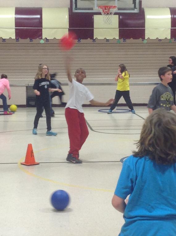 4th Grade Student Throwing the Ball during "3-Pin"