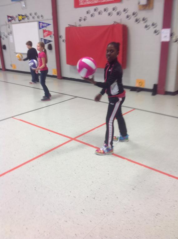 4th Grade Students Serving in Volleyball