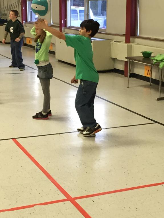 3rd Grade Student Hitting a Volleyball