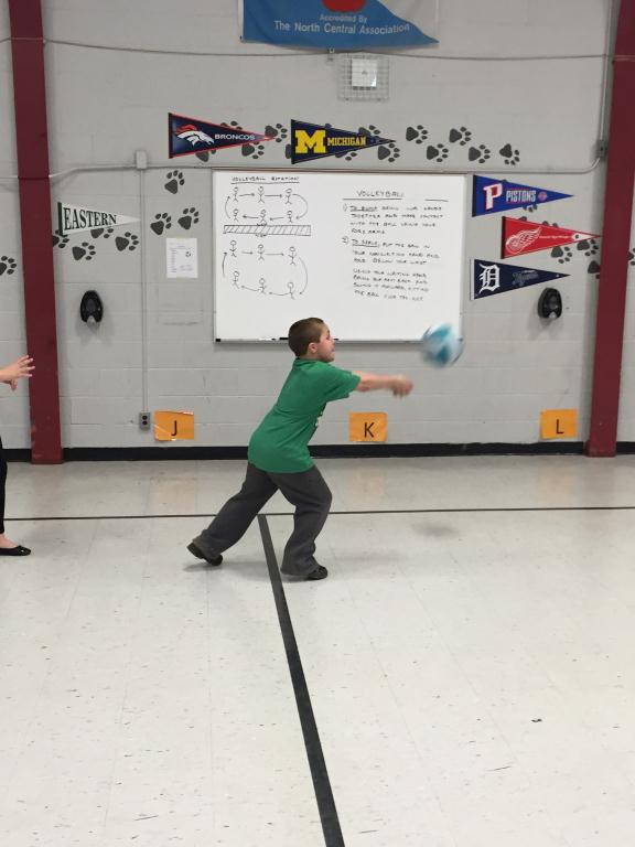4th Grade Student Hitting A Volleyball